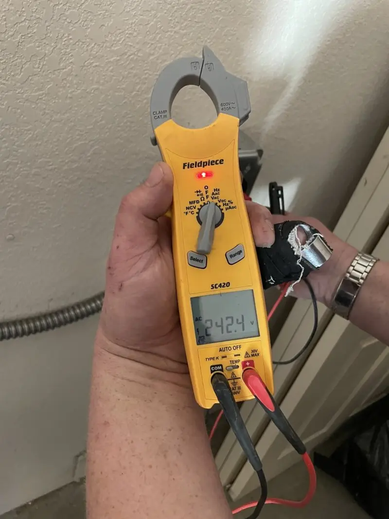 Voltage testing with clamp meter during Aluminum Wiring Replacement in Nash